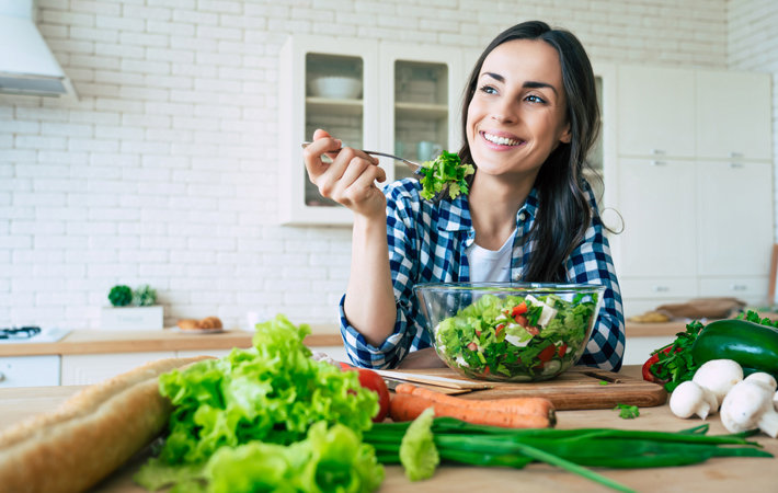 Woman eats healthy food