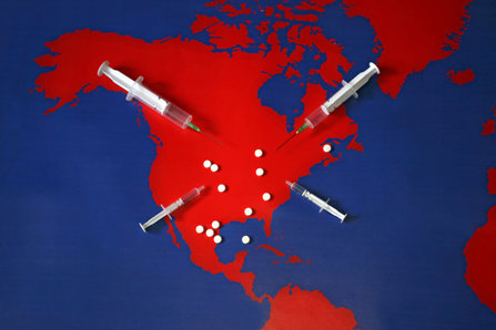 Red map of North American cont covered with drugs.