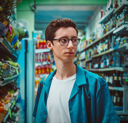 Young man in a supermarket.