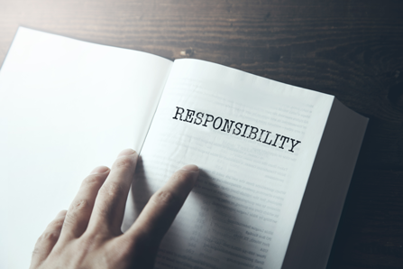 Open book with text - responsibility.