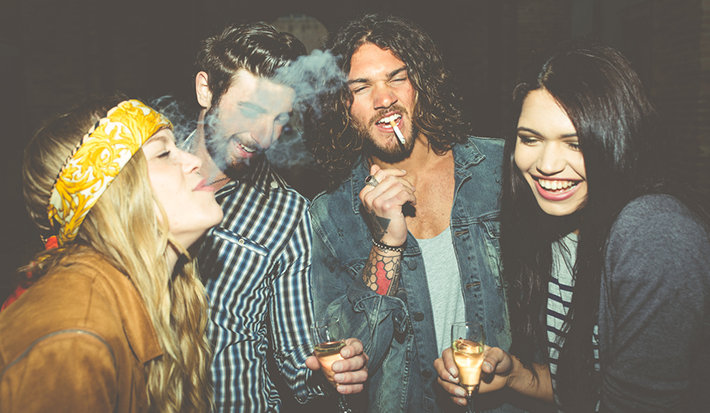 Young people smoking and drinking